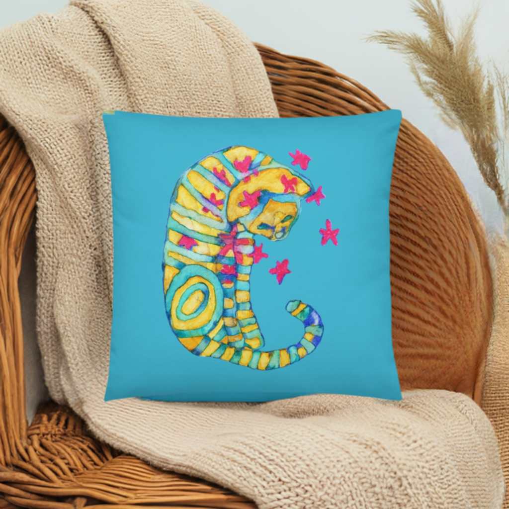 Dreamer Cat Pillow with colorful striped cat artwork on blue background, soft polyester fabric with hidden zipper.