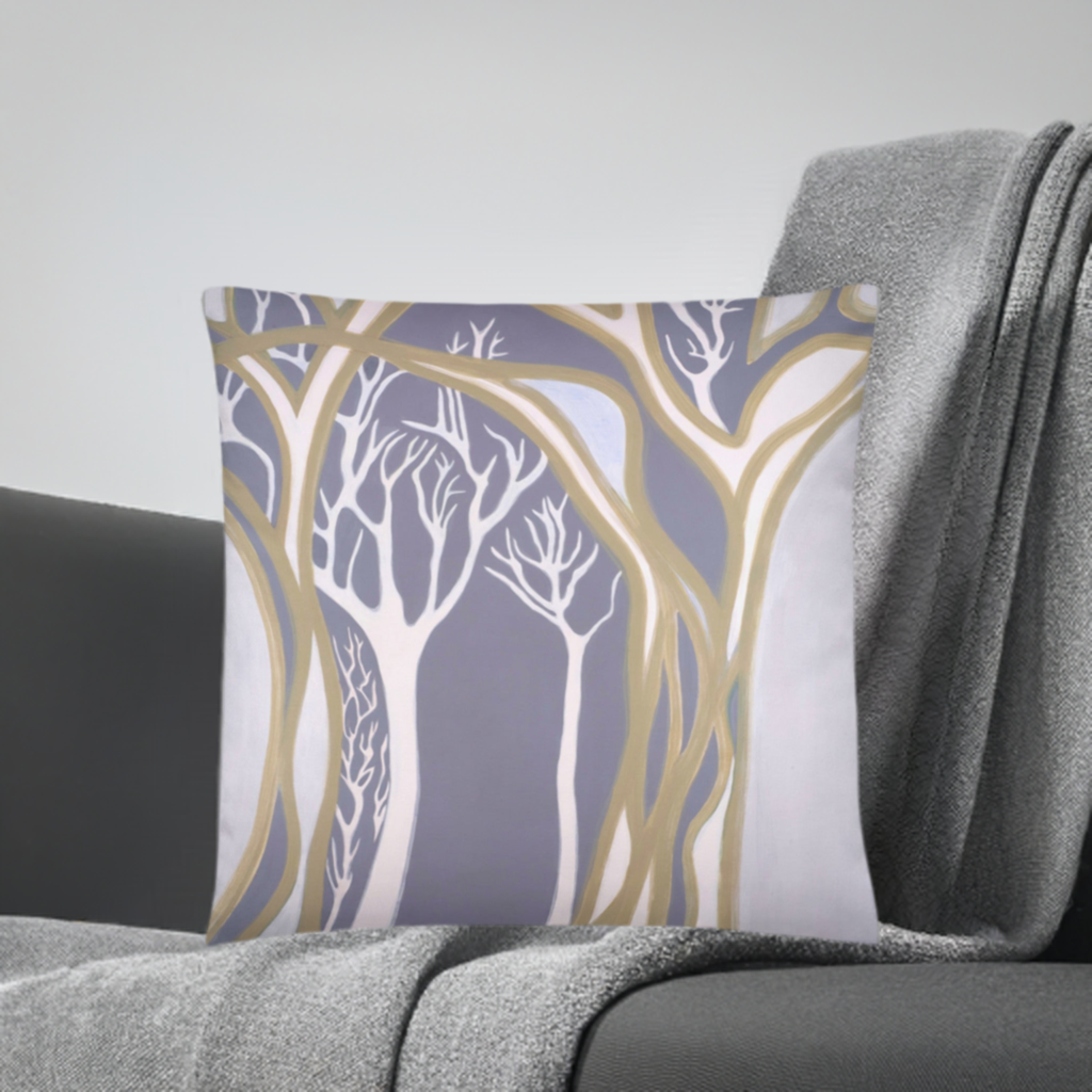 Gray Madrones Abstract Pillow with tree design and soft polyester fabric on gray couch with blanket