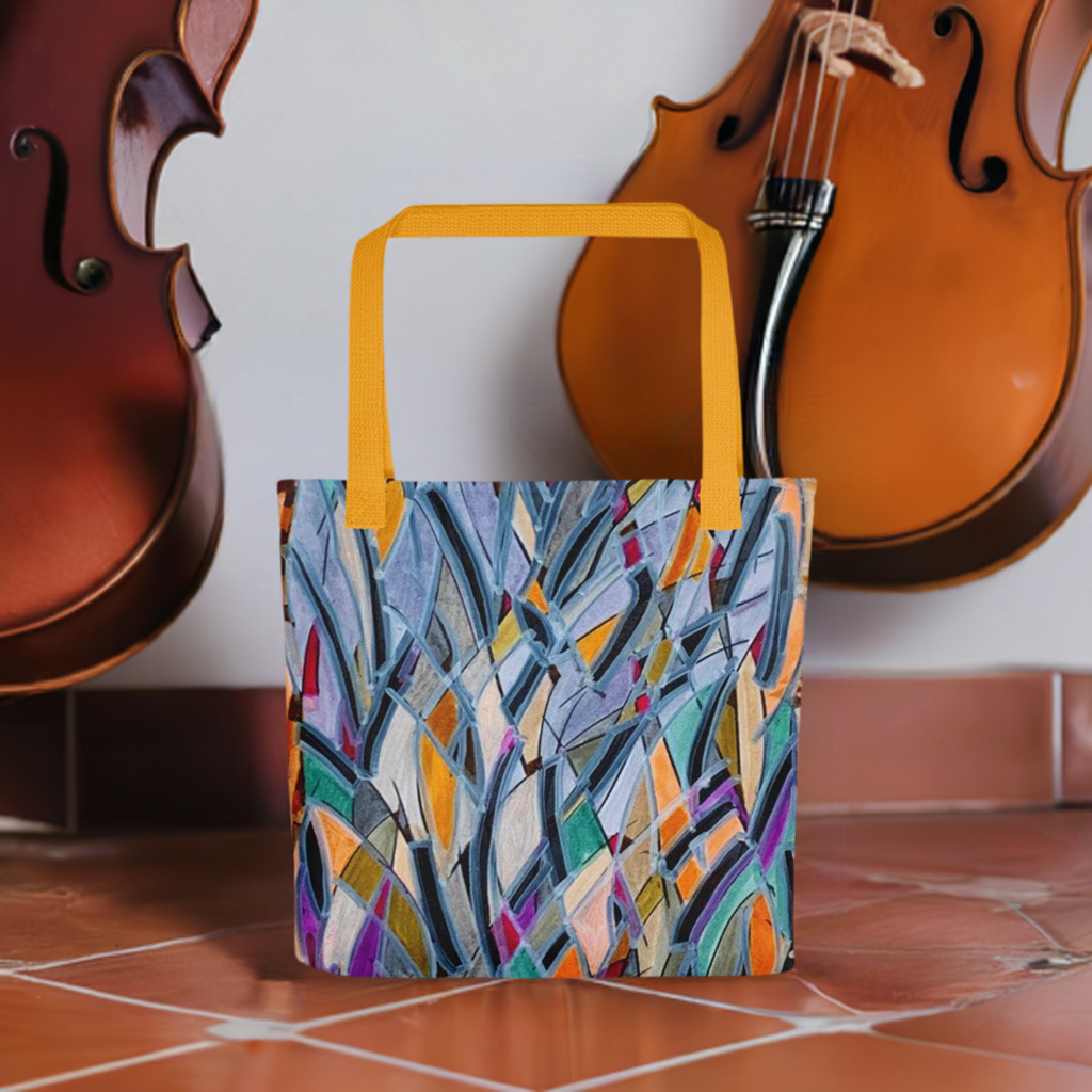 Sydney Opera Abstract Tote Bag with colorful geometric artwork and yellow handles next to string instruments