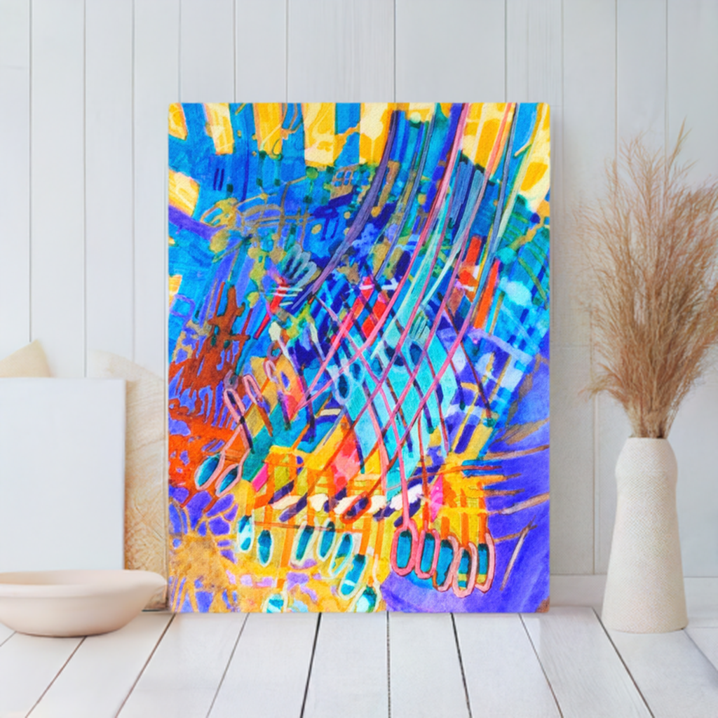 Ray of Hope Abstract Canvas Print by Joy Calonico vibrant colorful abstract art unframed on wooden floor with pampas grass decor