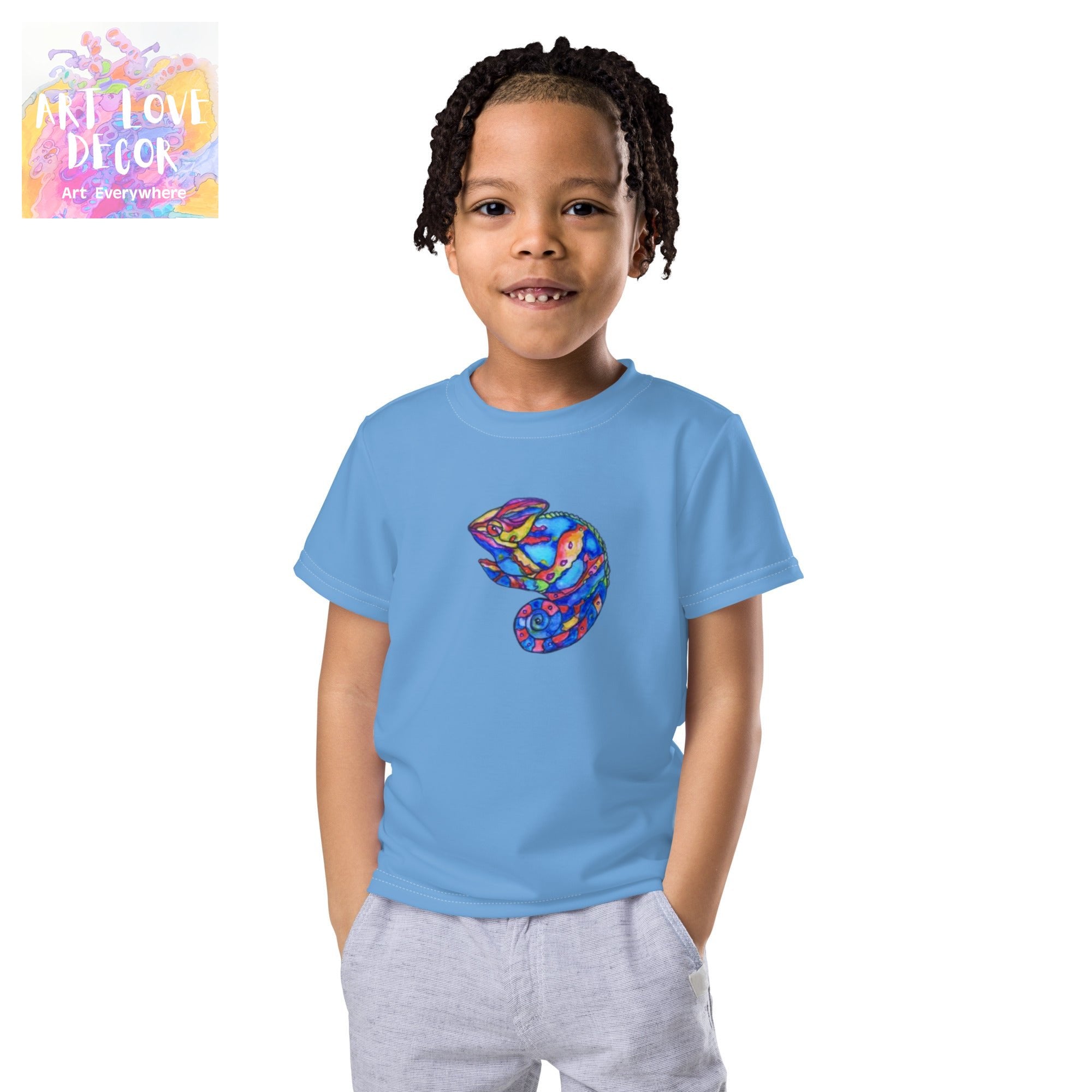 Child wearing blue lizard kid's t-shirt with colorful artwork by Joy Calonico, comfortable fit for active kids