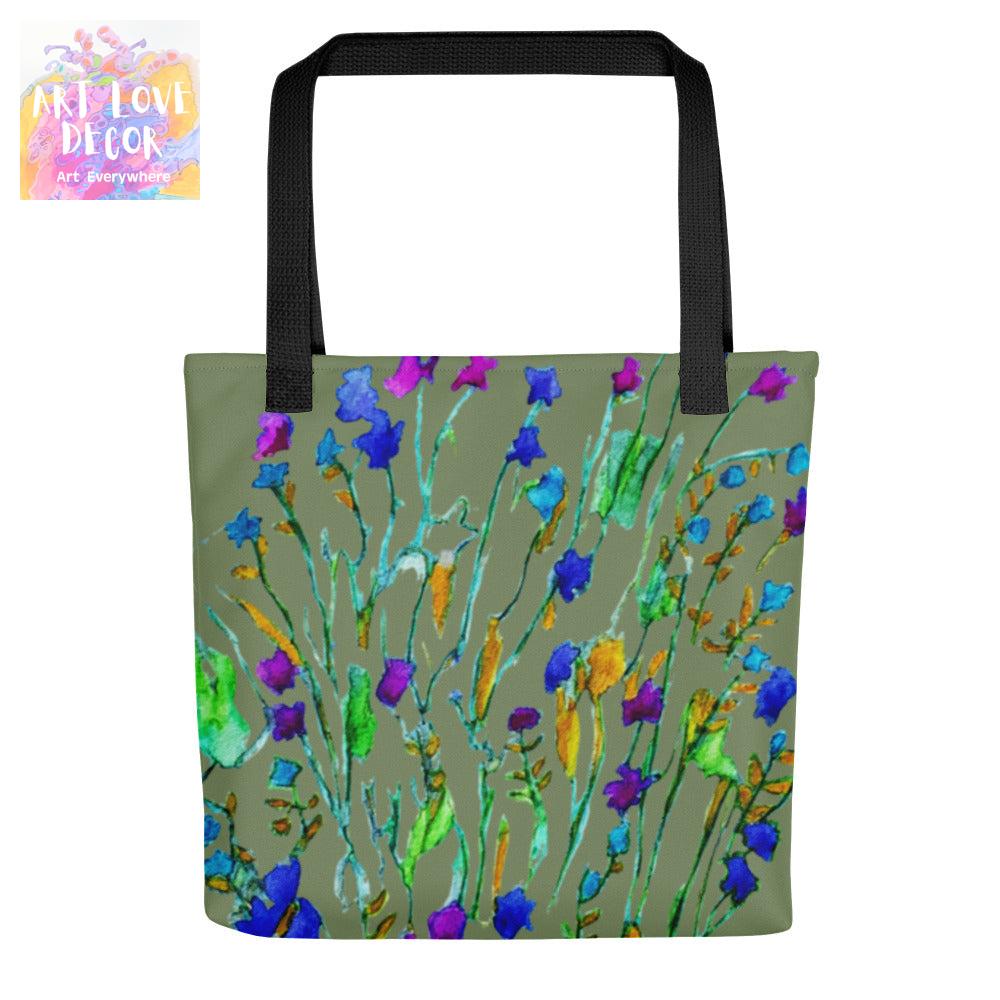Itty Bitty Blooms abstract floral tote bag with colorful blooms on green background and black handles