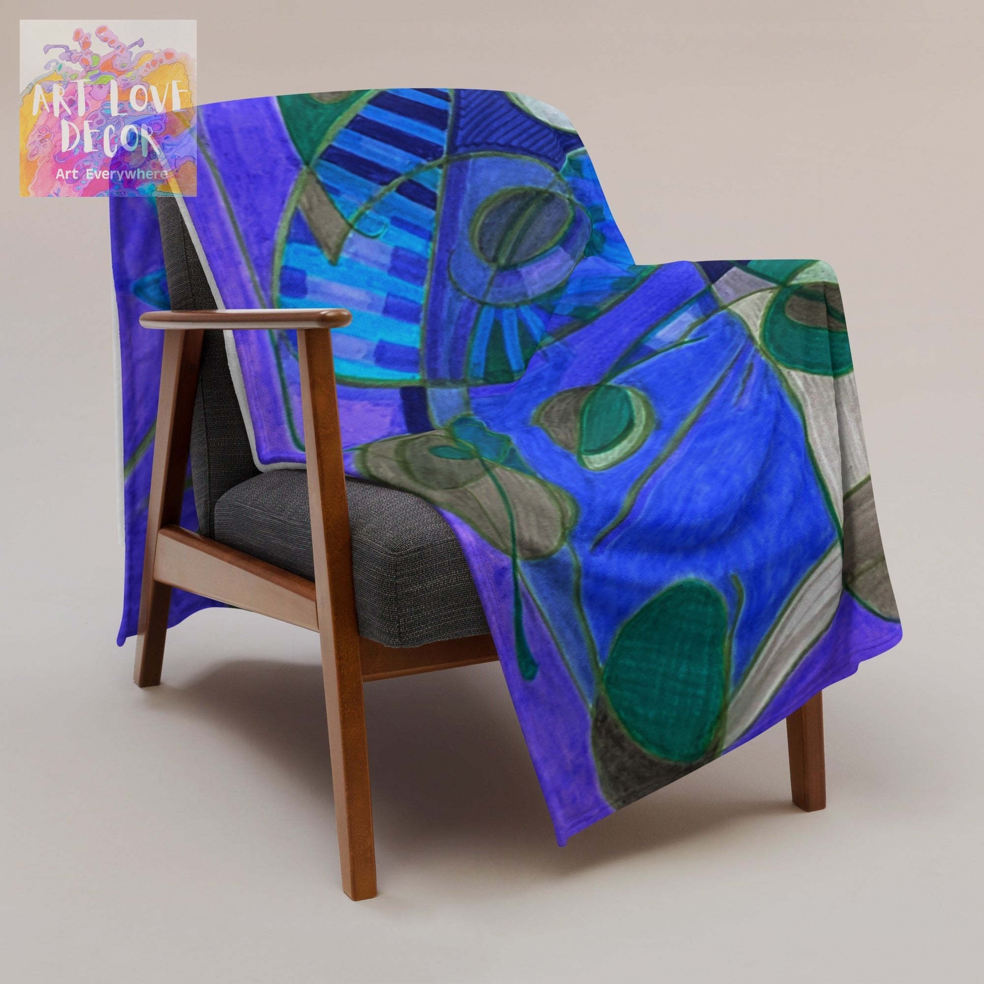 Knot Anymore Abstract Throw Blanket draped on chair with blue and green modern abstract art design