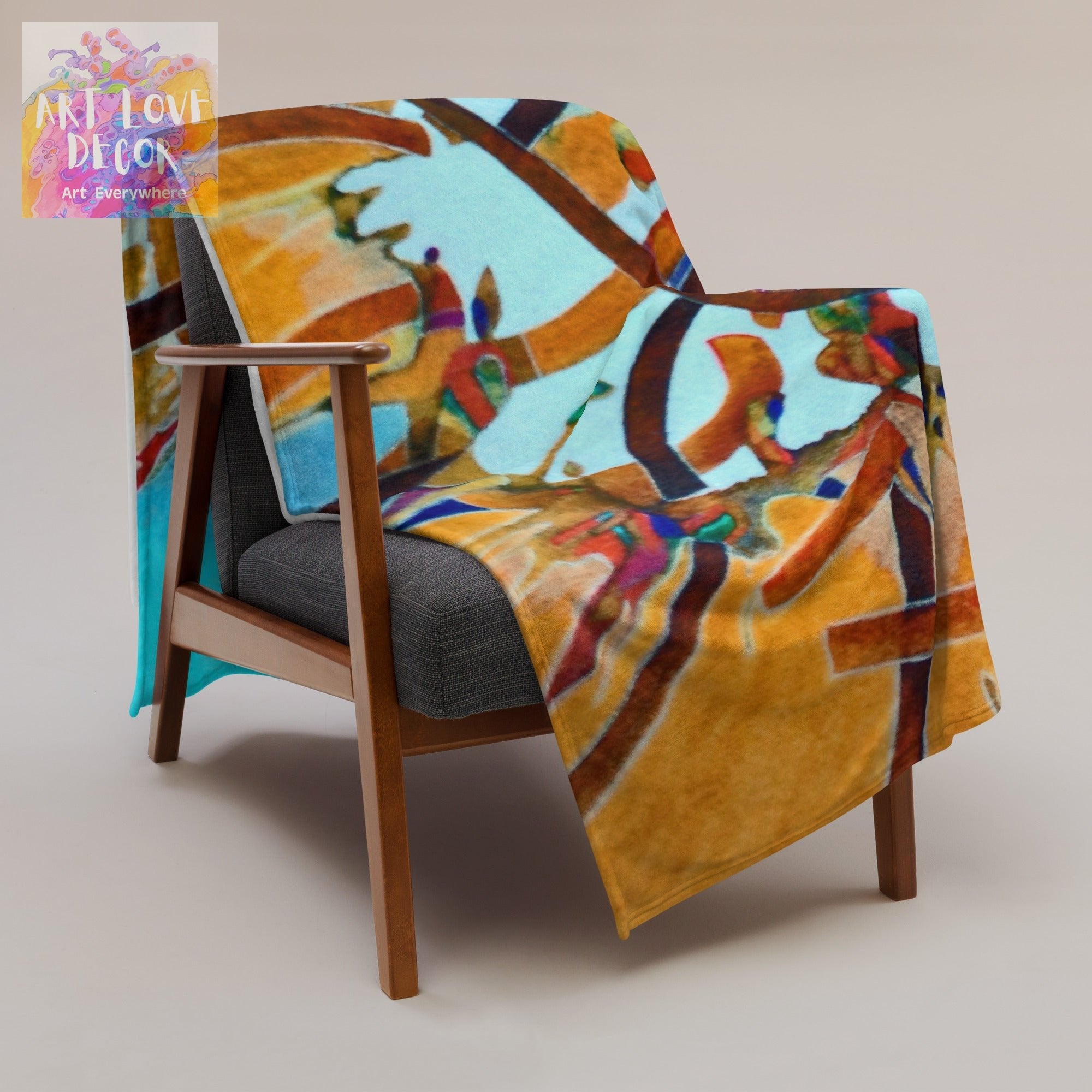 Unexpected Abstract Throw Blanket with vibrant colors draped over modern wooden chair